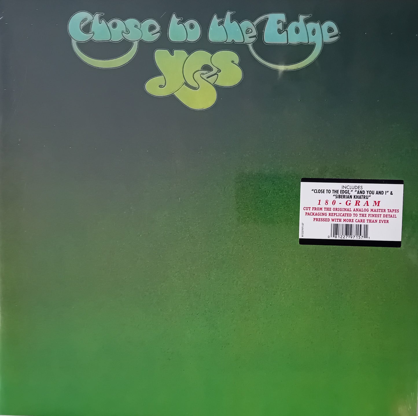 Cover of a Yes album with green gradient and logo