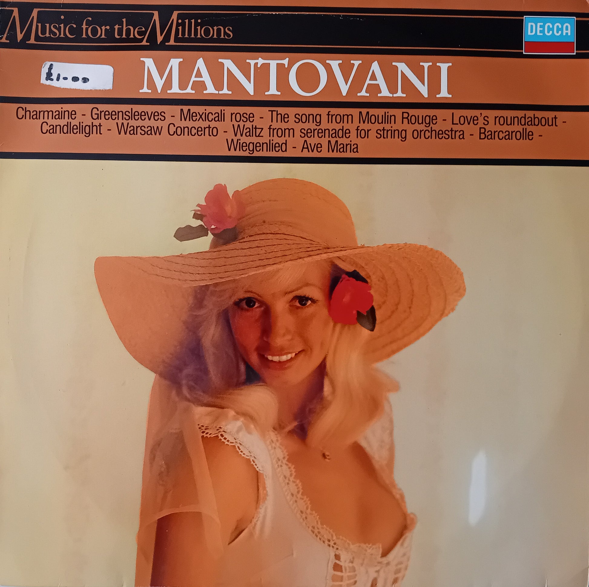 Album cover featuring a woman wearing a decorative hat with flowers, associated with Mantovani music.