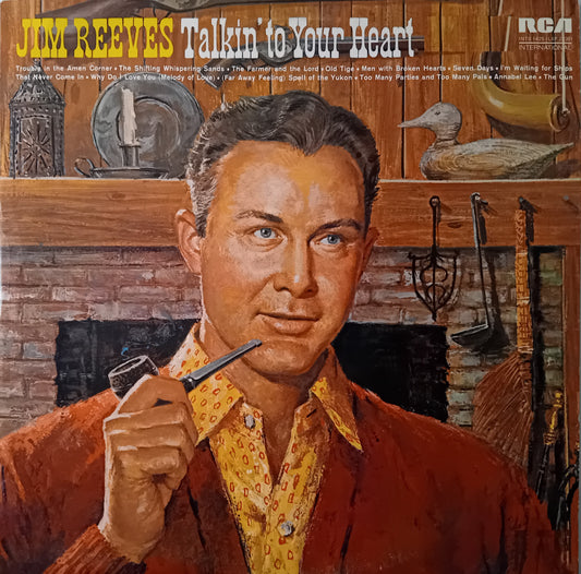 Album cover featuring a man with a pipe, set against a rustic background with text 'Jim Reeves Talkin' to Your Heart'.
