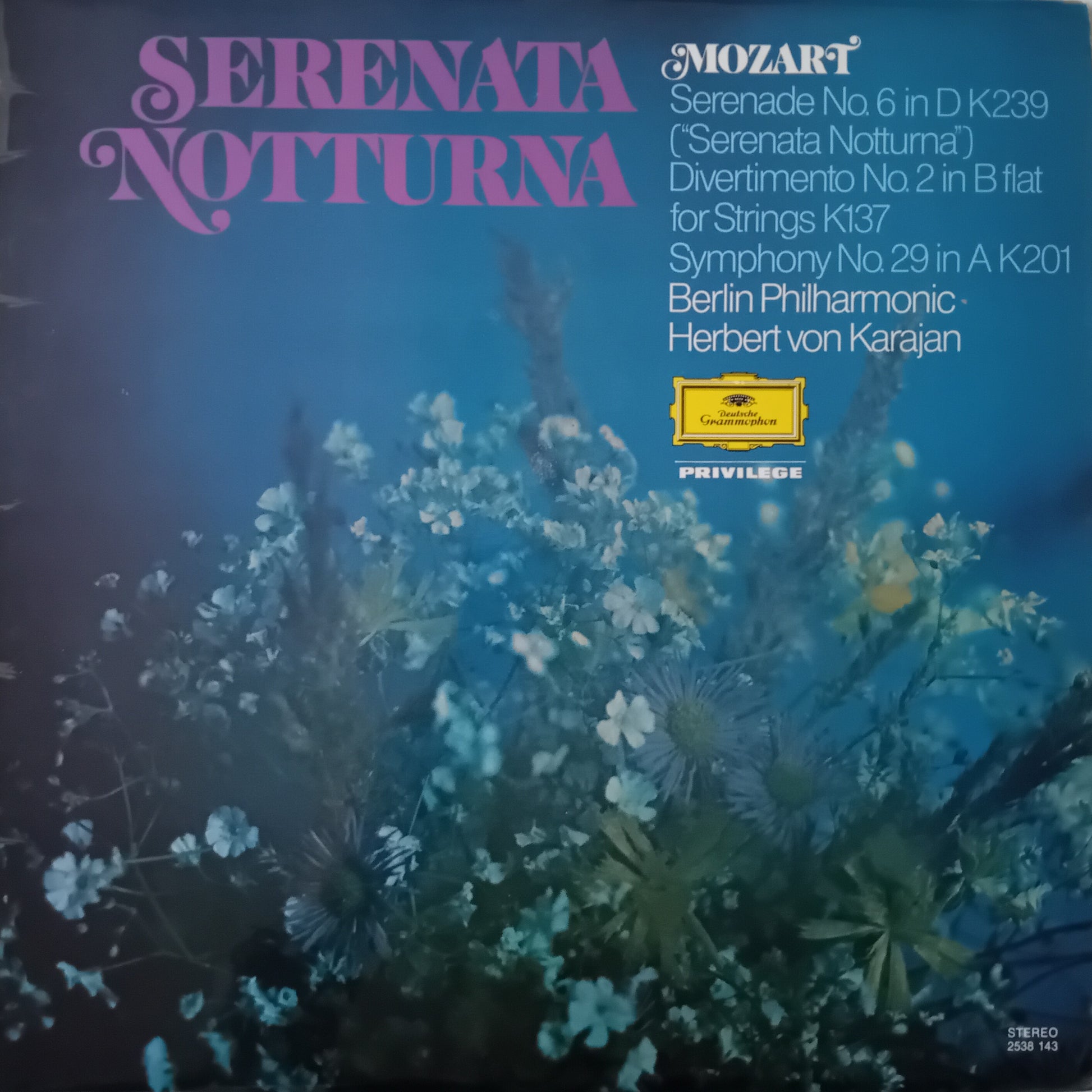 Album cover for Mozart's 'Serenata Notturna' with floral design and text.