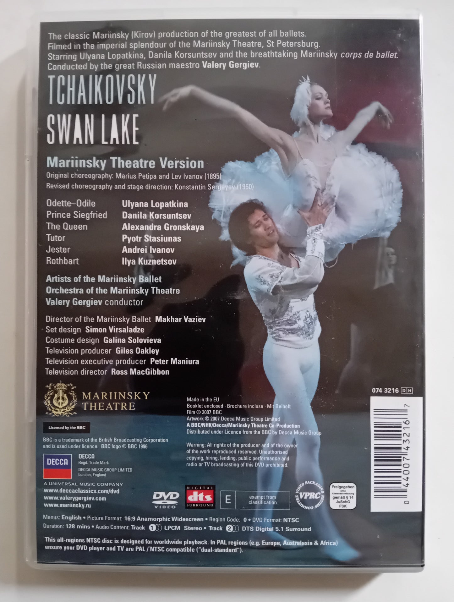 Tchaikovsky Swan Lake DVD cover from the Mariinsky Theatre, featuring a ballerina in a white tutu and a male dancer in a light blue and white costume against a dark stage background. The cover includes track listings, credits, and a barcode.