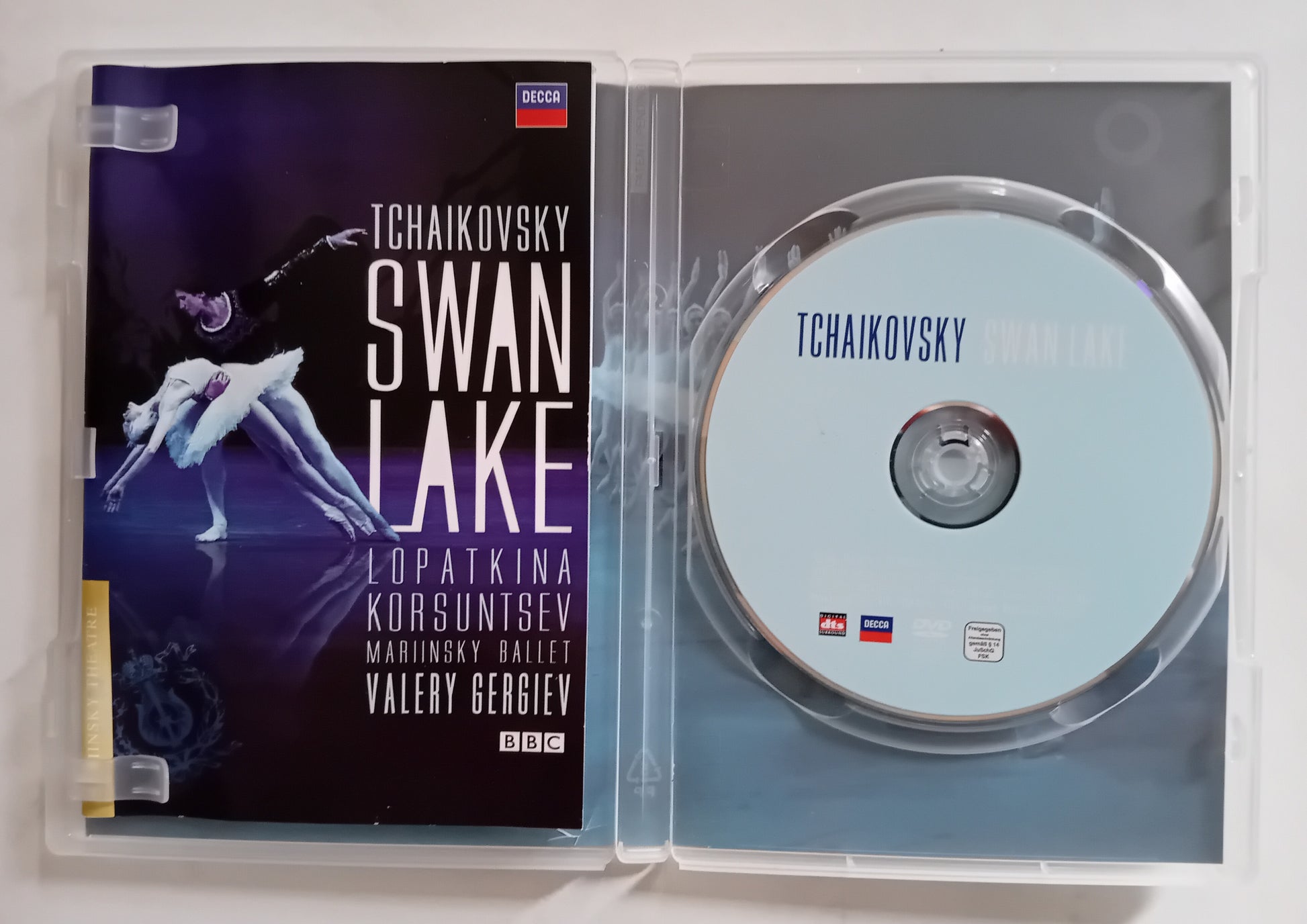 A Tchaikovsky Swan Lake DVD in a clear plastic jewel case, showing the printed cover on the left and the disc on the right against a white background.