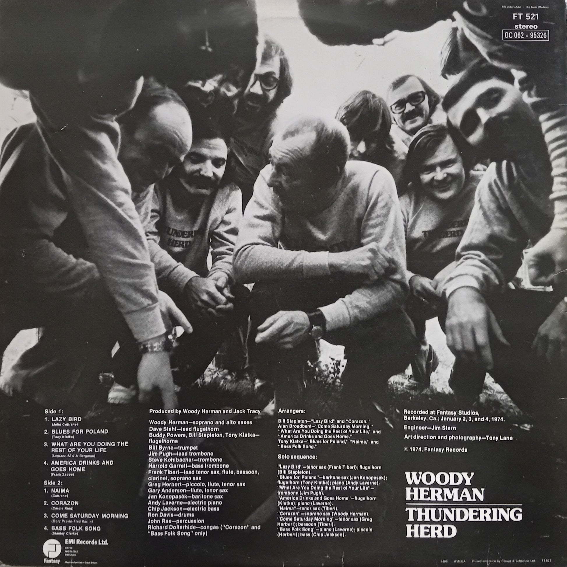 Back cover of a Woody Herman album with a group of people gathered around, featuring text and album details.