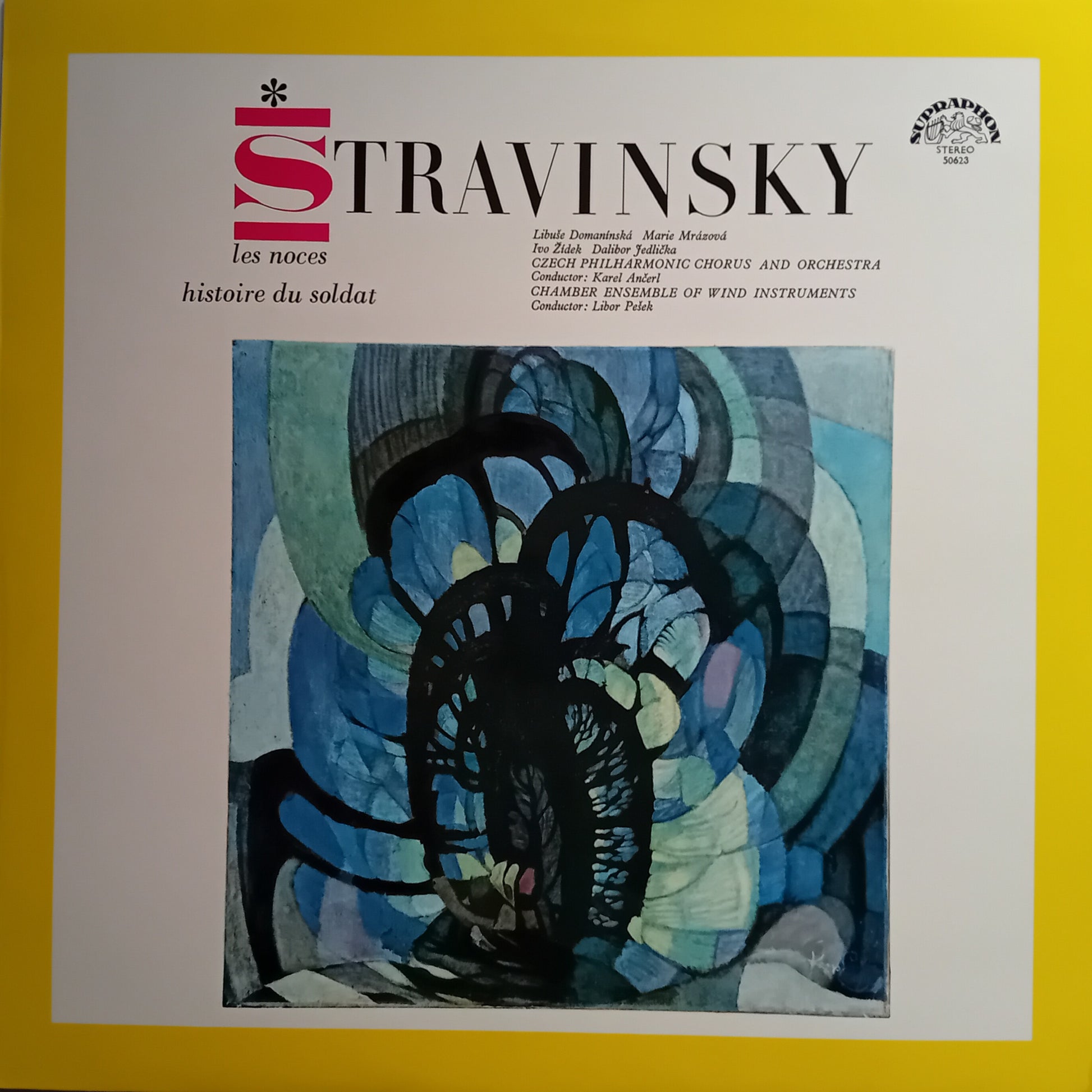 Vinyl record album cover for Sergei Stravinsky's 'Les noces' (The Wedding Dance), featuring a white background with a large red 'S' and black text, alongside an abstract blue and black painting. The record is photographed flat against a solid yellow background.
