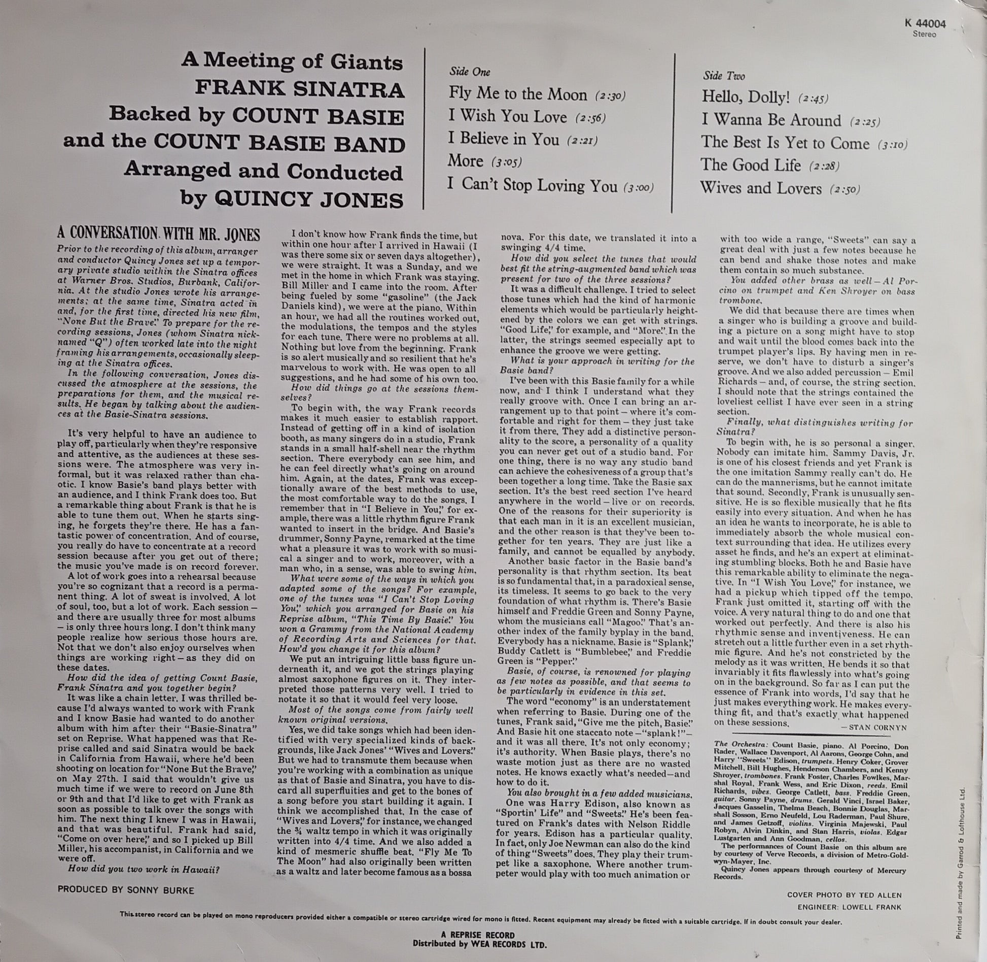 Back cover of a vinyl record with text listing songs and credits