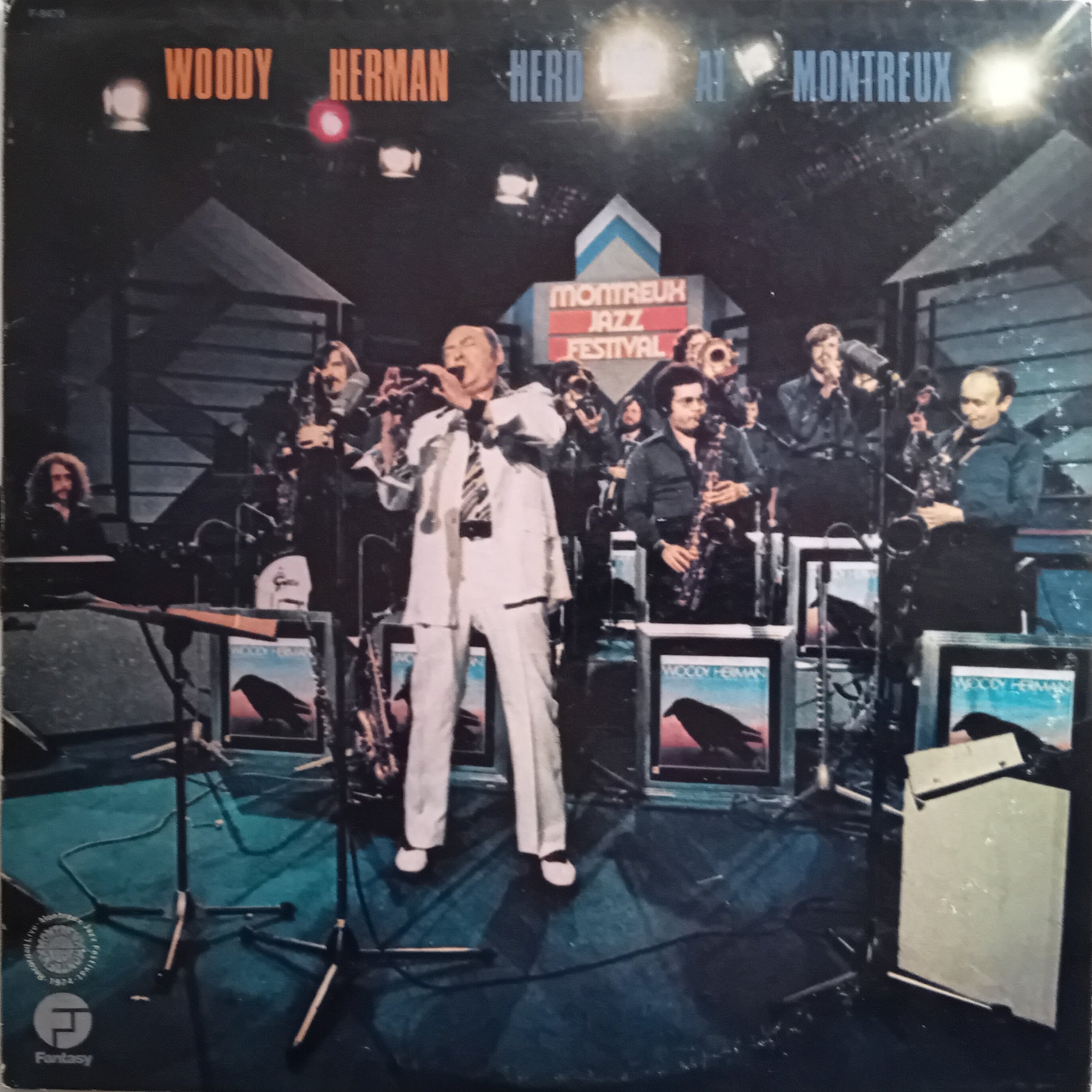 Album cover with a band on stage at Montreux Jazz Festival, featuring Woody Herman and Herb Alpert.
