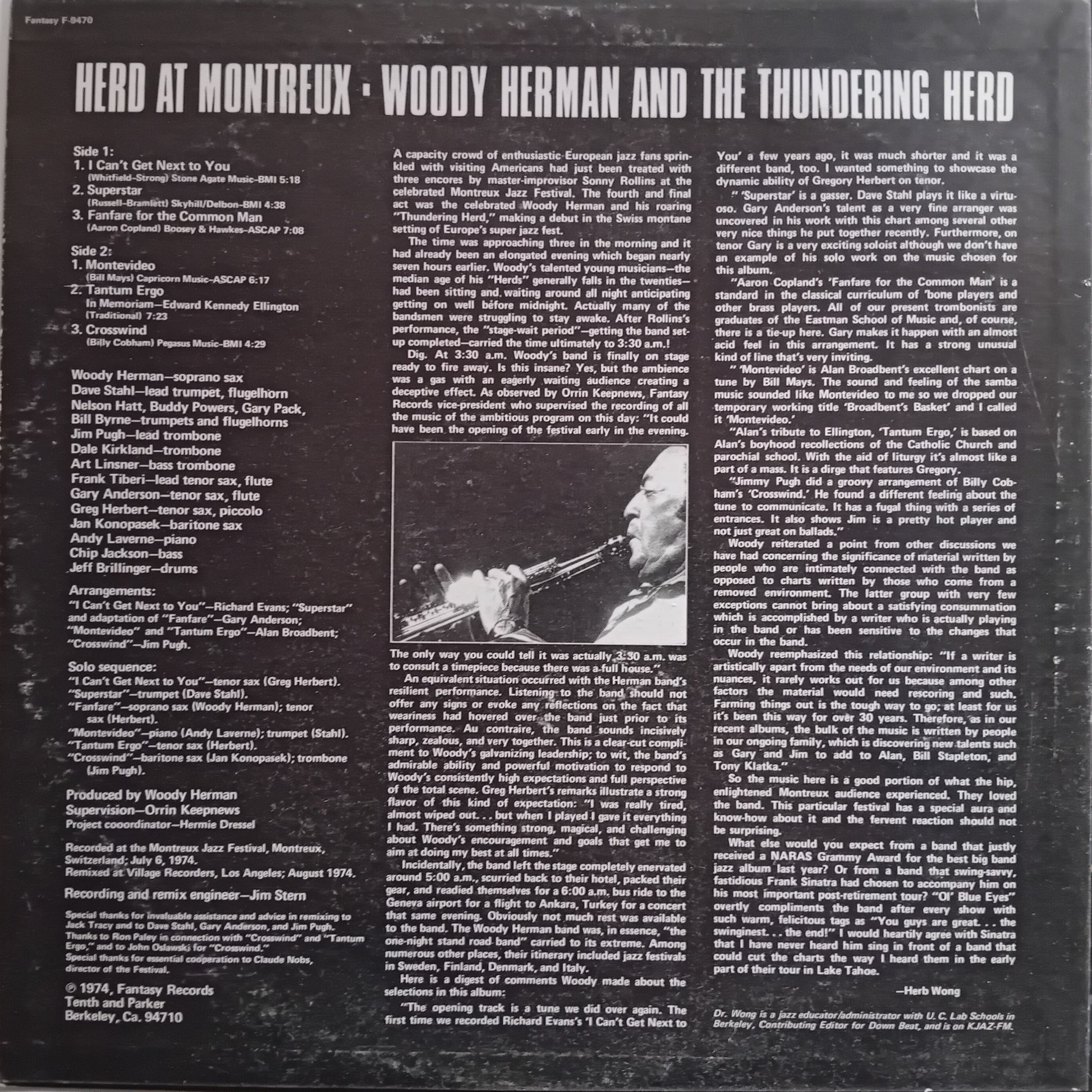 Back cover of a vinyl record featuring text and a black and white photo of a musician playing a saxophone.