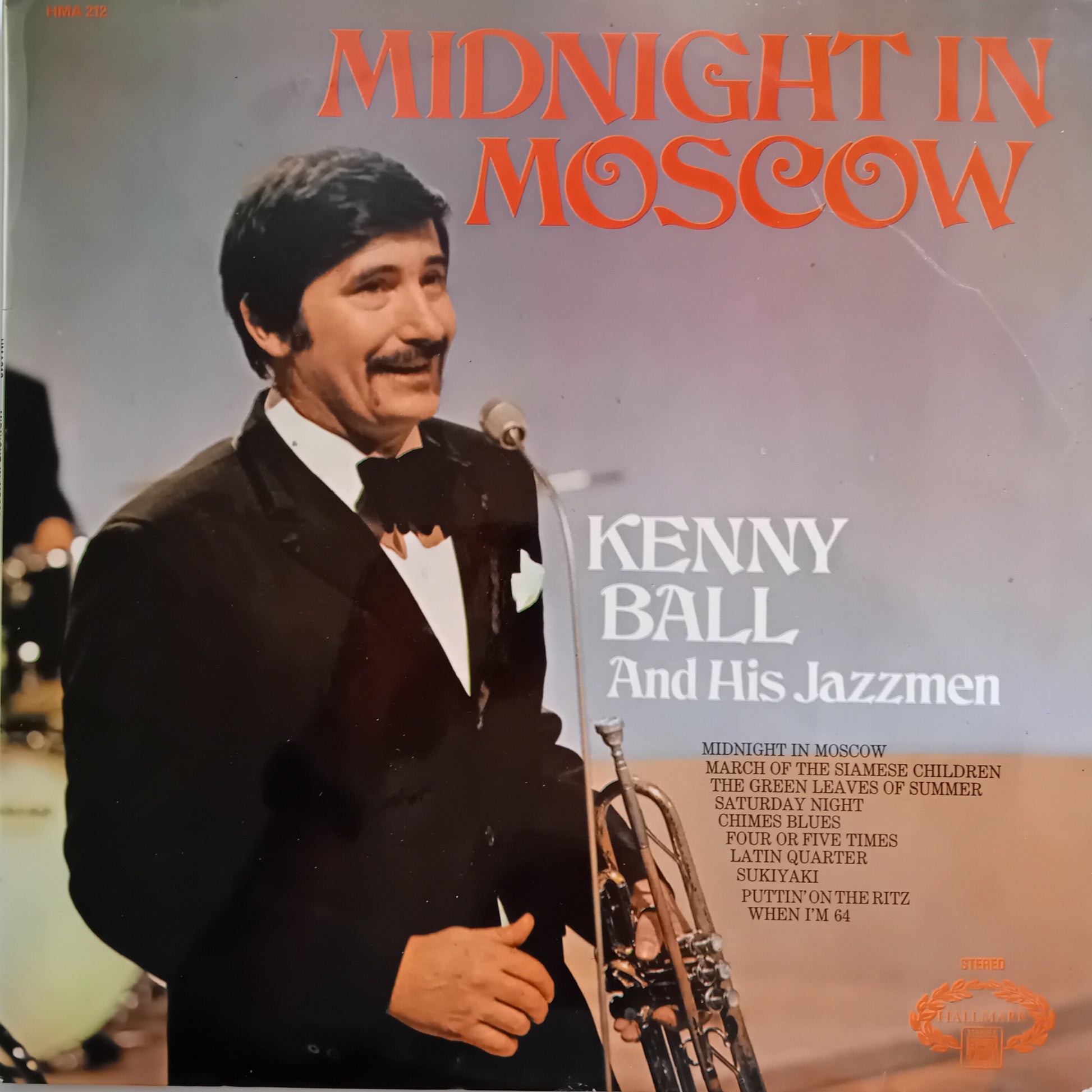 Album cover for 'Midnight in Moscow' by Kenny Ball and His Jazzmen featuring a man in a suit with a microphone.