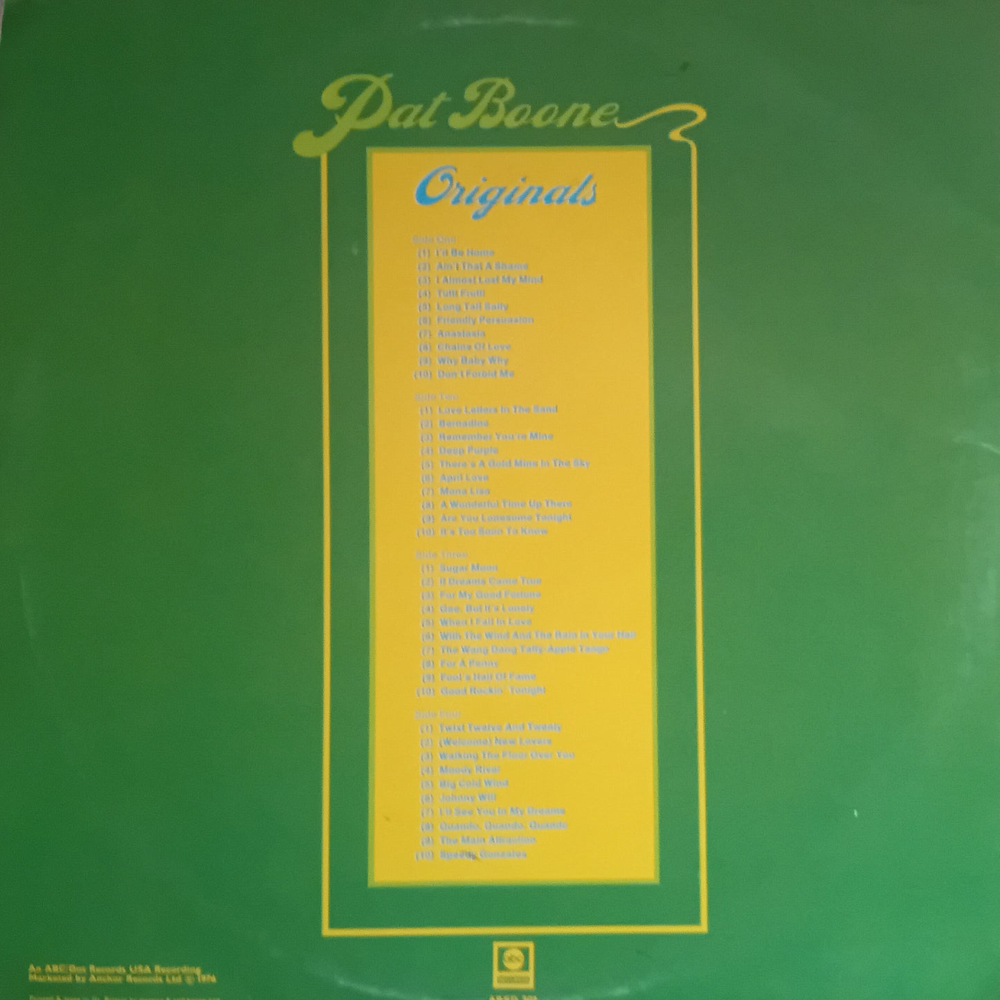 Vinyl record cover with 'Pat Boone Originals' text on a green background