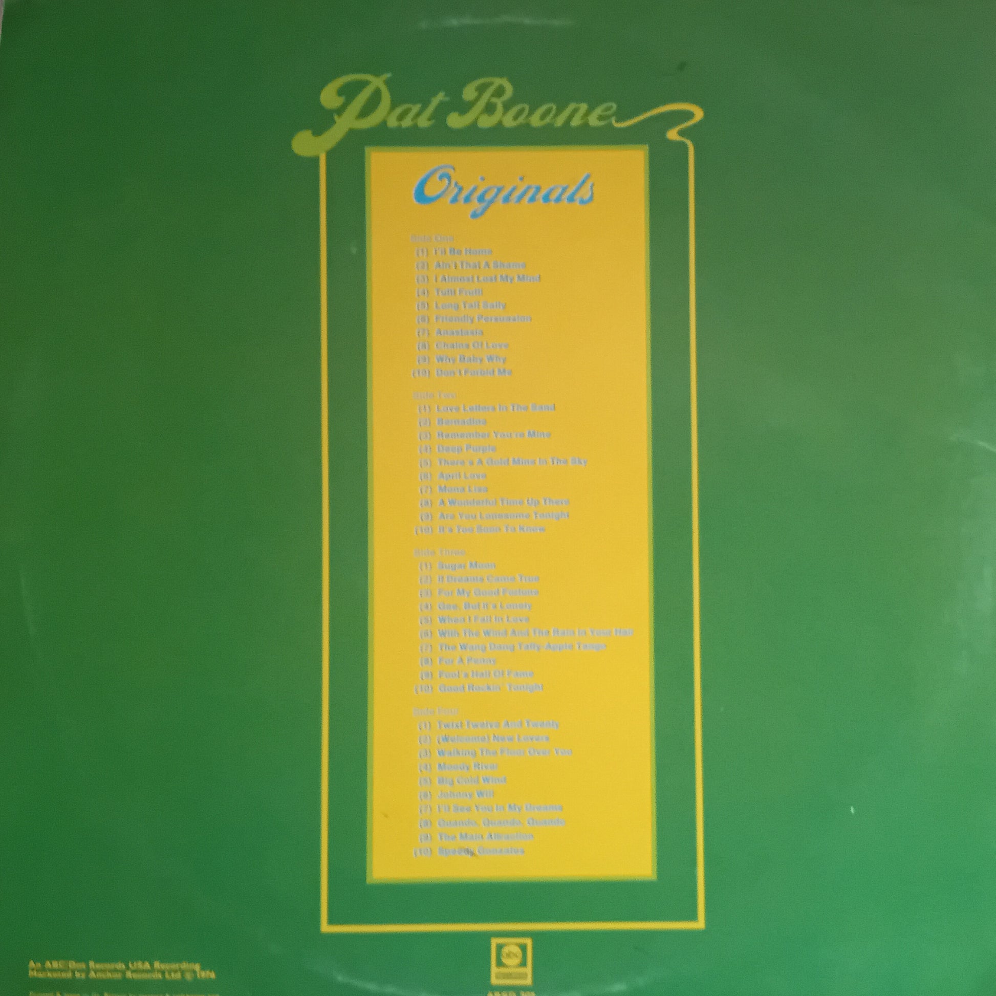 Vinyl record cover with 'Pat Boone Originals' text on a green background