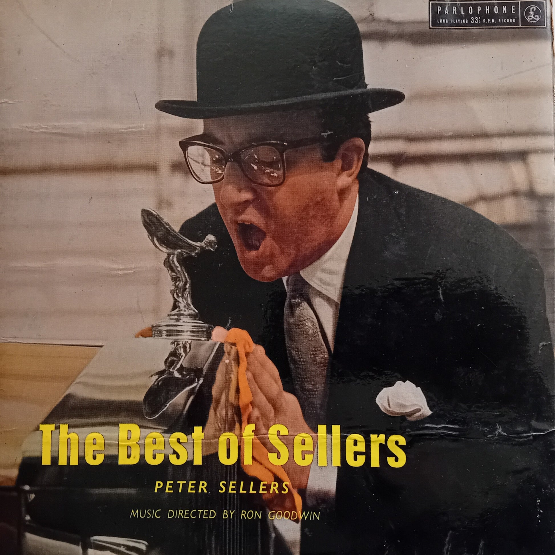 Album cover featuring a man in a suit and hat with text 'The Best of Sellers' and 'Peter Sellers'.