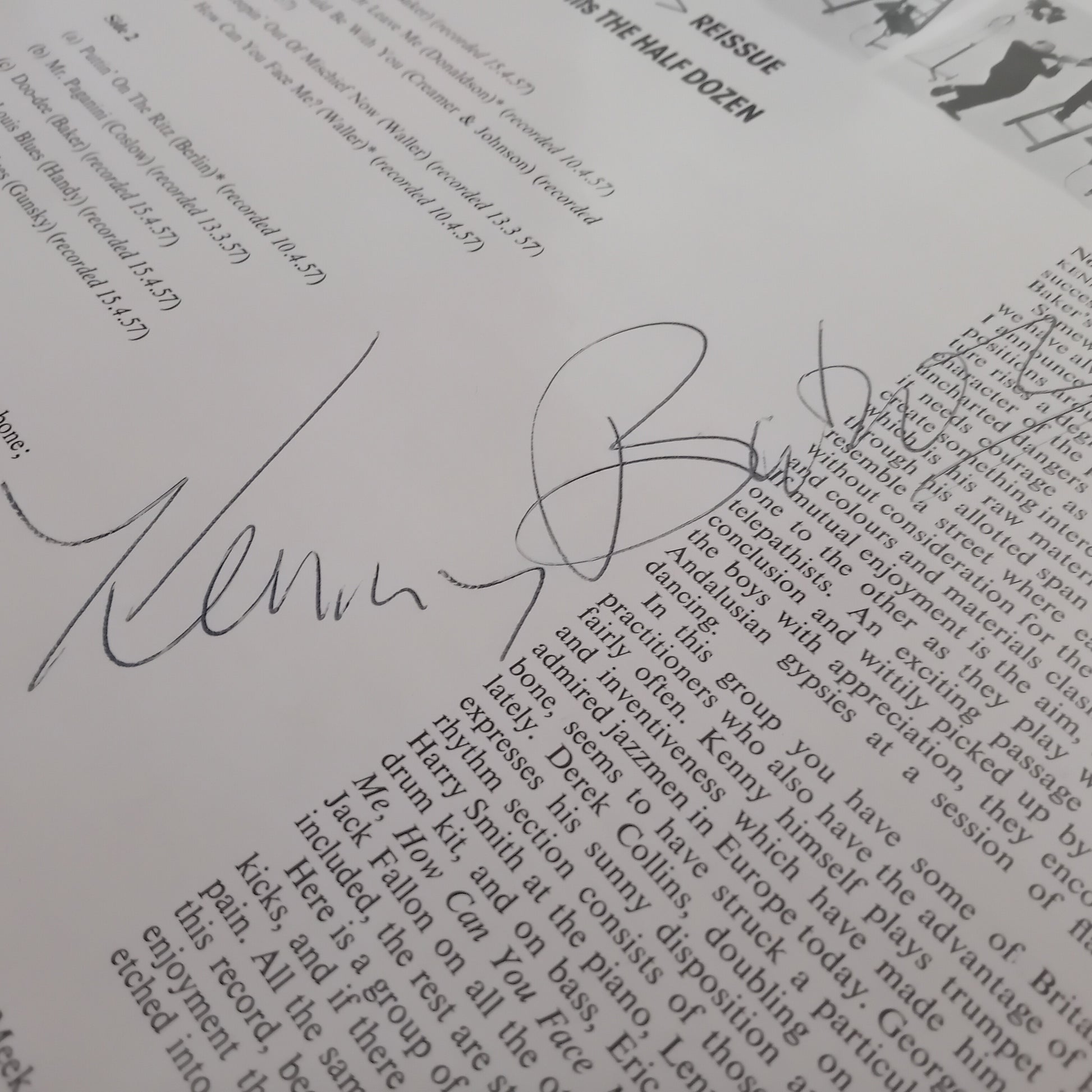 Document with a signature on a printed text background