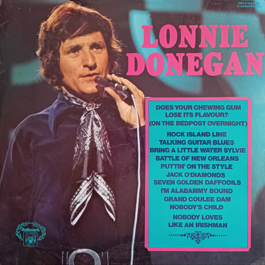 Album cover featuring a man singing into a microphone with text about song titles.