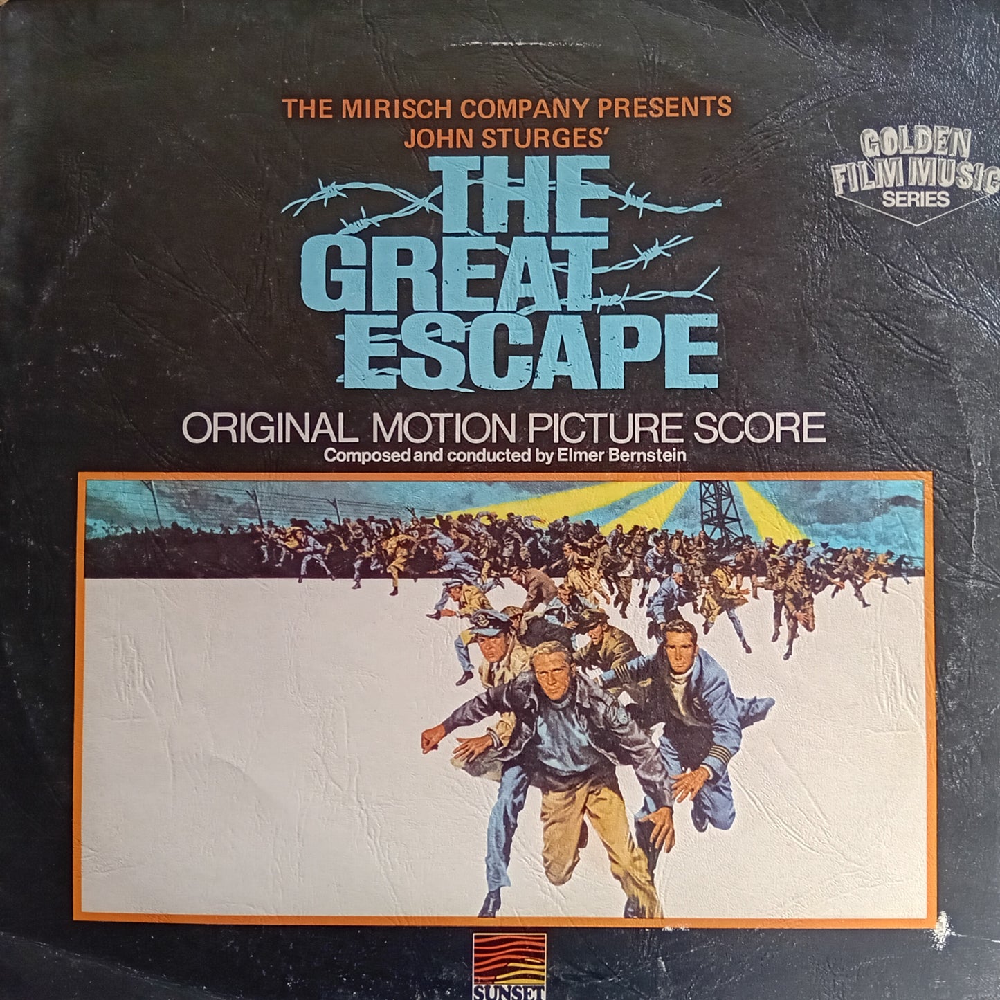 Album cover for 'The Great Escape' original motion picture score with barbed wire and prisoner illustration.
