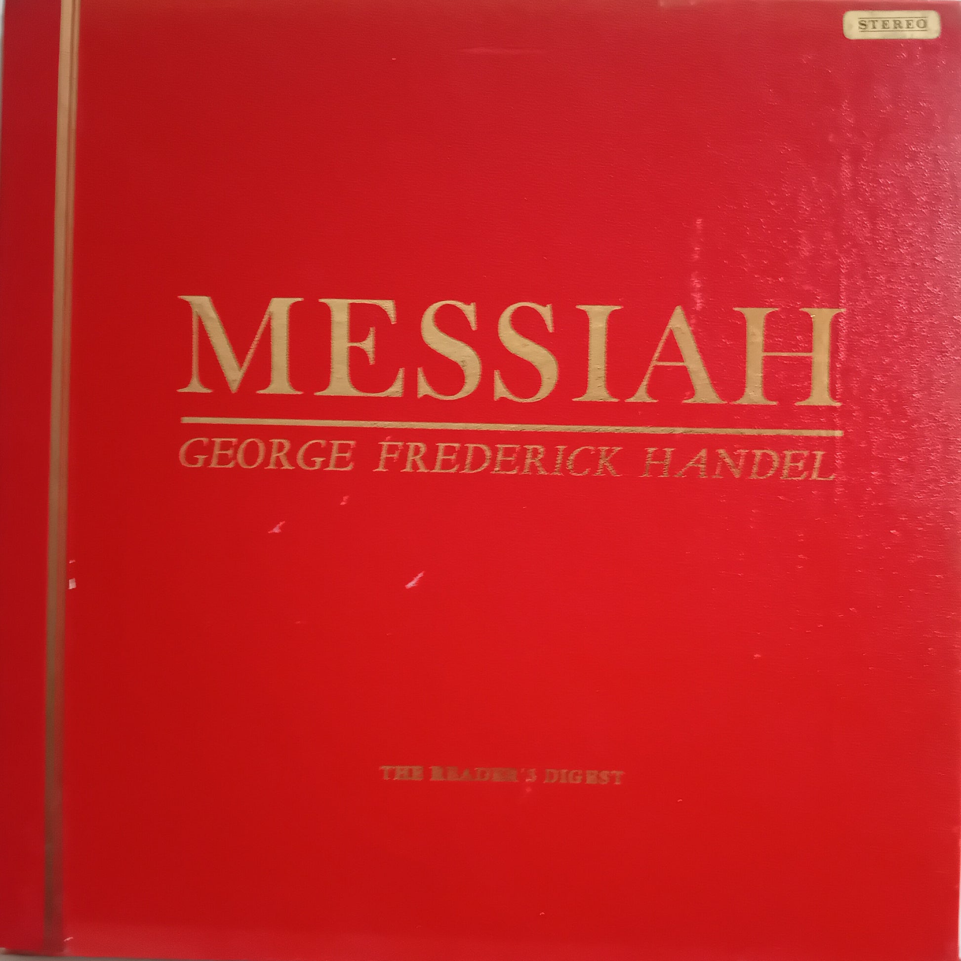 A red album cover for 'Messiah' by George Frederick Handel, featuring gold lettering and a small 'STEREO' label in the top right corner.