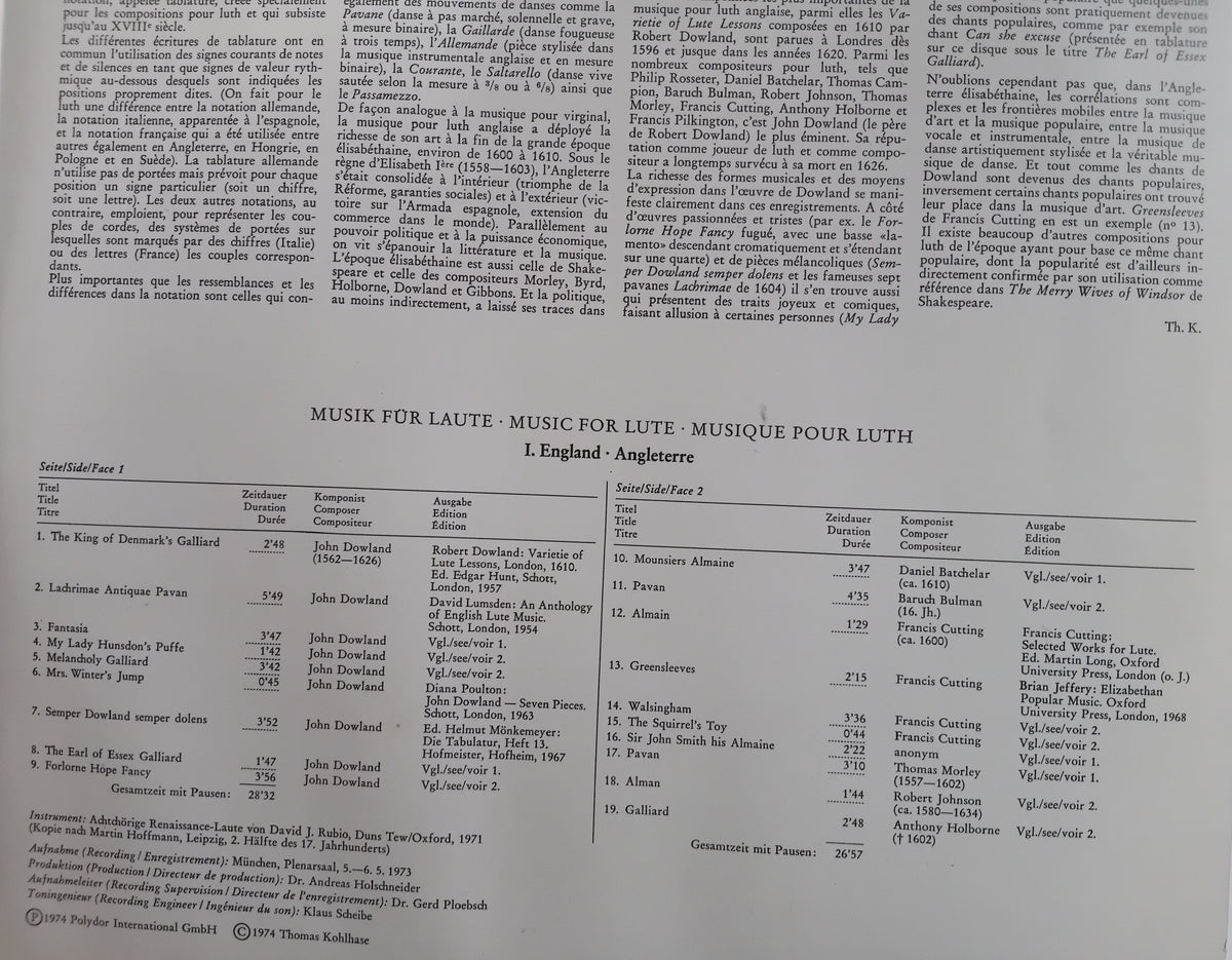 A photographed printed LP cover with dense black text on off-white paper, including song titles, composer names, and a music notation section at the bottom.