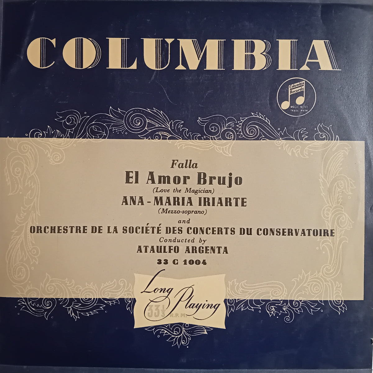 A vintage Columbia record sleeve  'Falla's El Amor Brujo' featuring a dark blue background with gold lettering and ornate scrollwork, and a cream central label area with printed text.