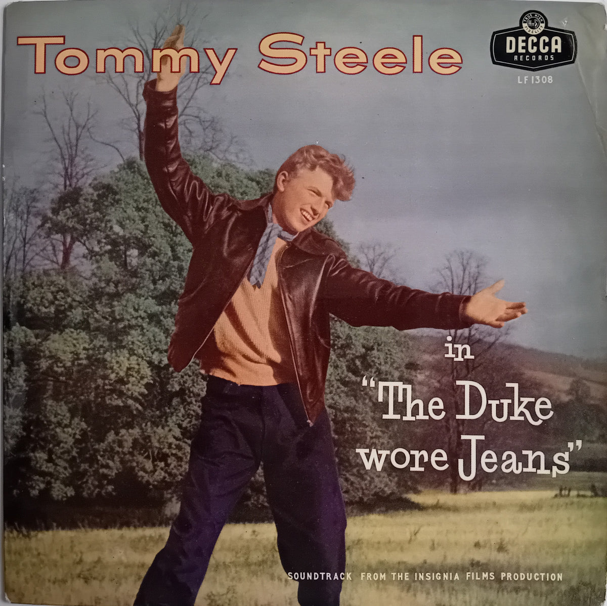 Vinyl record cover for Tommy Steele's soundtrack to 'The Duke wore Jeans', released by Decca Records. The cover features a color photograph of Tommy Steele outdoors in a leather jacket and jeans, with the title text printed on a light background.