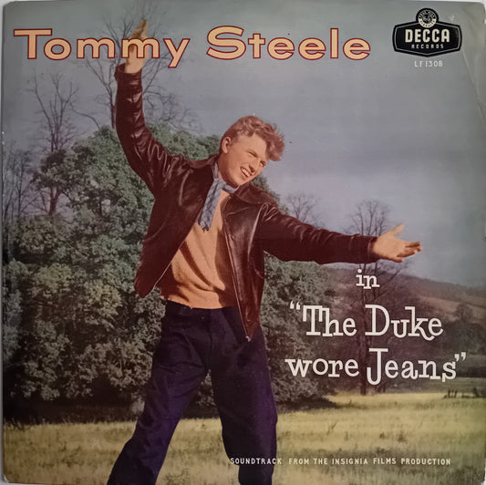 Vinyl record cover for Tommy Steele's soundtrack to 'The Duke wore Jeans', released by Decca Records. The cover features a color photograph of Tommy Steele outdoors in a leather jacket and jeans, with the title text printed on a light background.