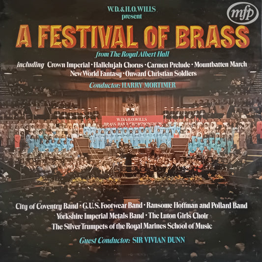 Album cover for 'A Festival of Brass' featuring a large concert photograph of a brass ensemble and orchestra in a stadium, with prominent title text and performer credits.