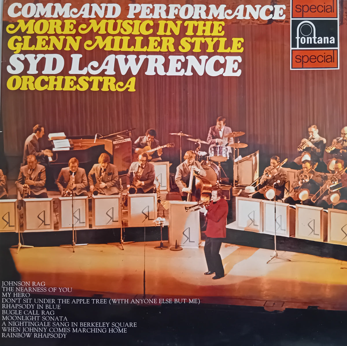 Album cover for 'Command Performance: More Music in the Glenn Miller Style' by Syd Lawrence Orchestra, featuring a live orchestral performance on stage with drums, brass instruments, and a conductor. The cover has a warm orange-brown gradient background with bold yellow and white text and a Fontana Special logo in the top right.