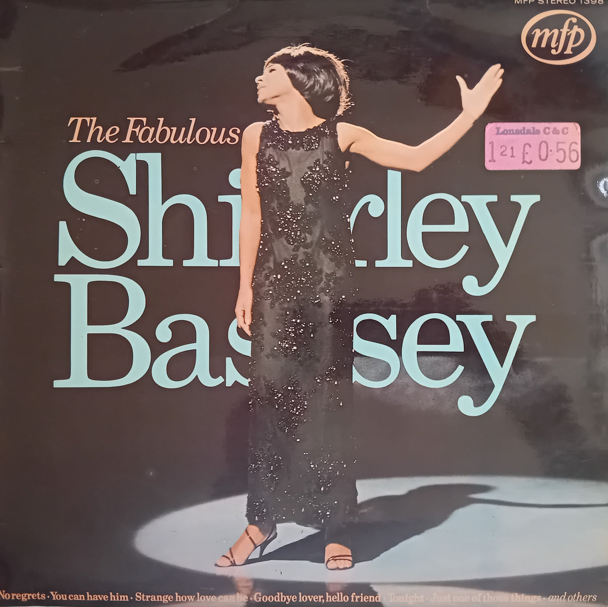 Vinyl record cover for 'The Fabulous Shirley Bassey' on MFP Records, featuring a photo of Shirley Bassey in a black sequined dress against a dark background with large light blue text.