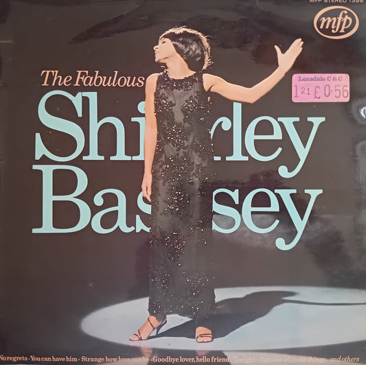 Vinyl record cover for 'The Fabulous Shirley Bassey' on MFP Records, featuring a photo of Shirley Bassey in a black sequined dress against a dark background with large light blue text.