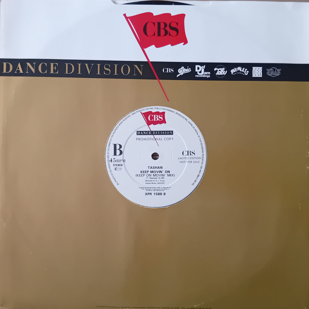 CBS Dance Division 12-inch vinyl record sleeve for 'Keep Movin' On' by Tashan featuring a gold inner sleeve, white outer sleeve with CBS logo, and a visible record label in the centre.