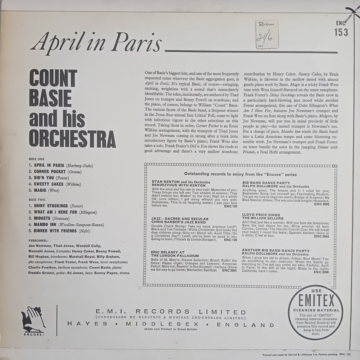 The back cover of a vintage music record album titled 'April in Paris' by Count Basie and his orchestra, published by EMI Records Limited. The cover is printed in black ink on a warm beige background, featuring track listings, reviews, and the EMI logo.