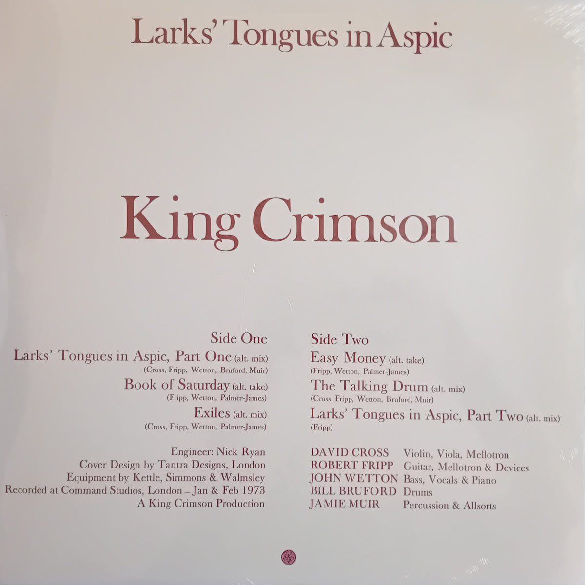 A square album cover for King Crimson's 'Larks' Tongues in Aspic' showing the tracklist in black text on a warm off-white background with the band name in large maroon lettering.