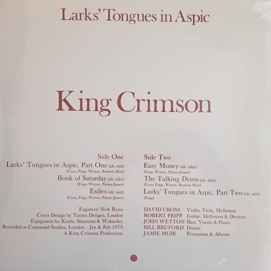 A square album cover for King Crimson's 'Larks' Tongues in Aspic' showing the tracklist in black text on a warm off-white background with the band name in large maroon lettering.