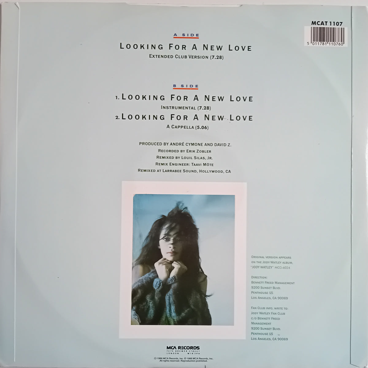 The back cover of a vinyl record sleeve for Jody Watley's 'Looking For A New Love' Extended Club Version, featuring track listings, production credits, and a central portrait photo of the artist.