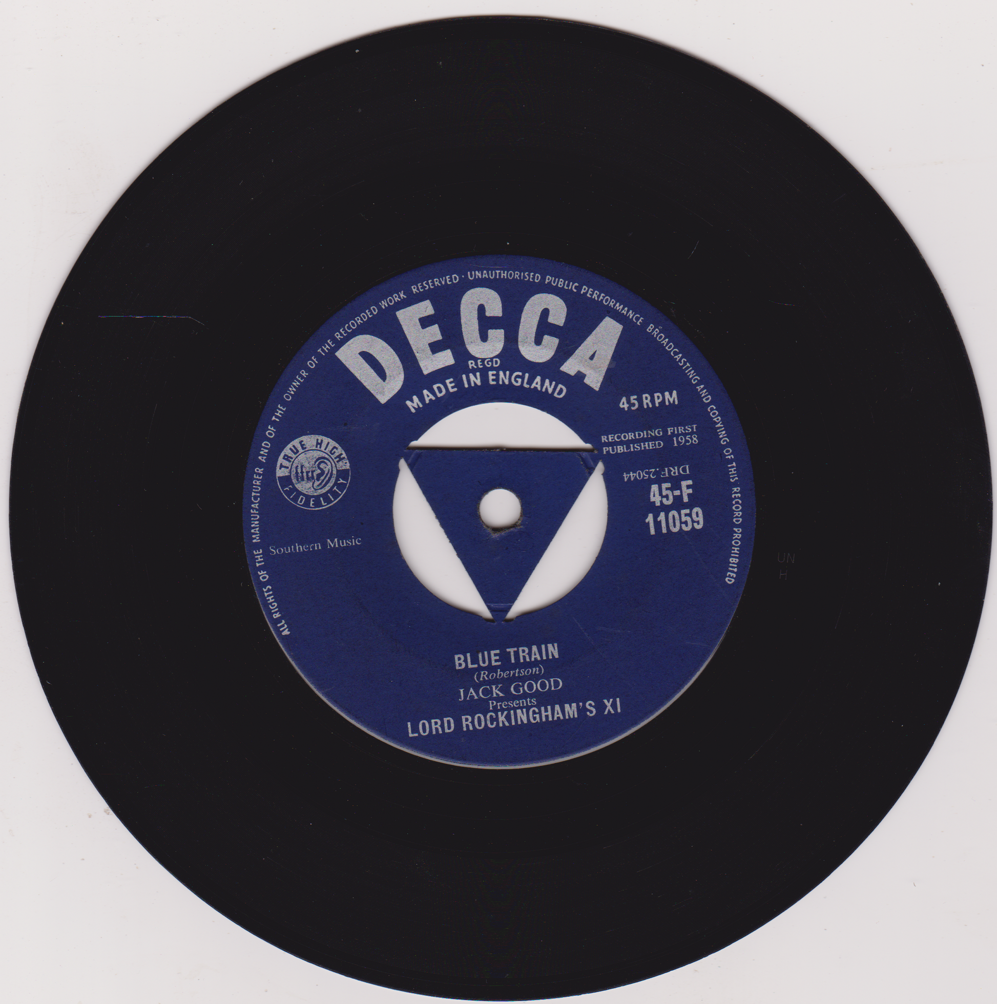 Decca label on a black vinyl record with blue label