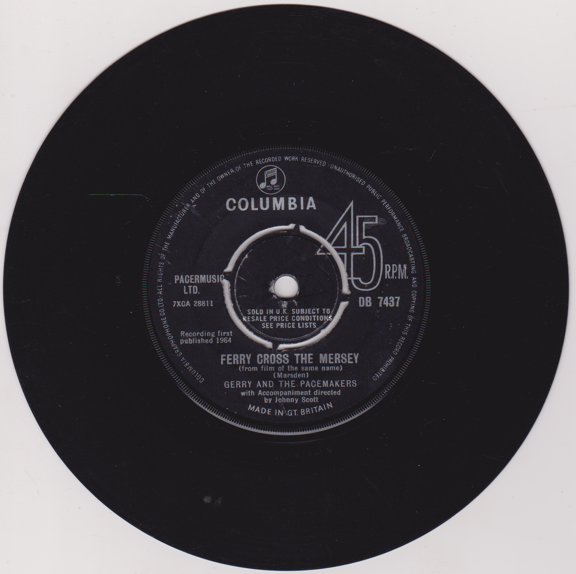 Record label of a vinyl record with 'Columbia' branding and song information.