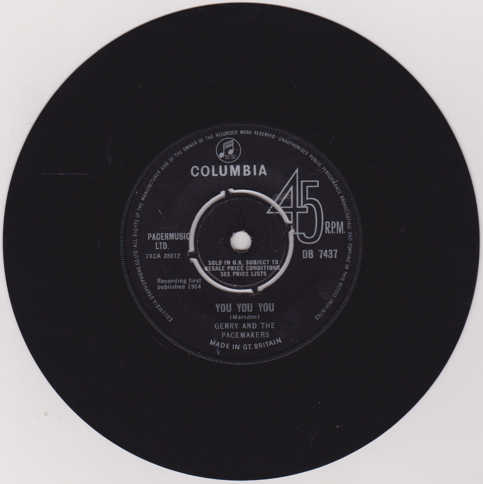Black vinyl record with Columbia label on a white background