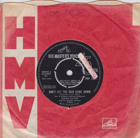 Vinyl record with red cover featuring HMV branding