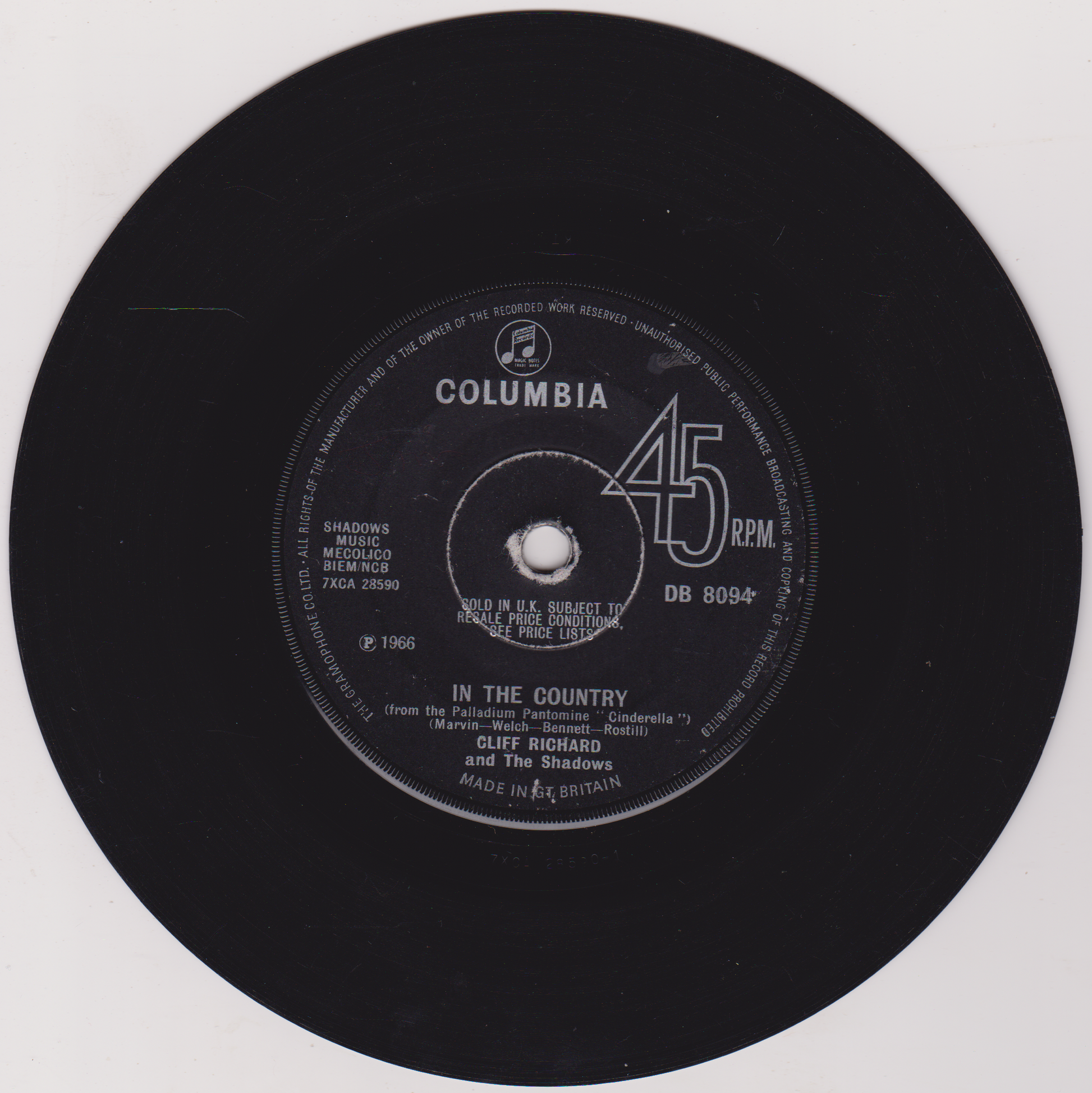 Black vinyl record with Columbia label and text on a white background
