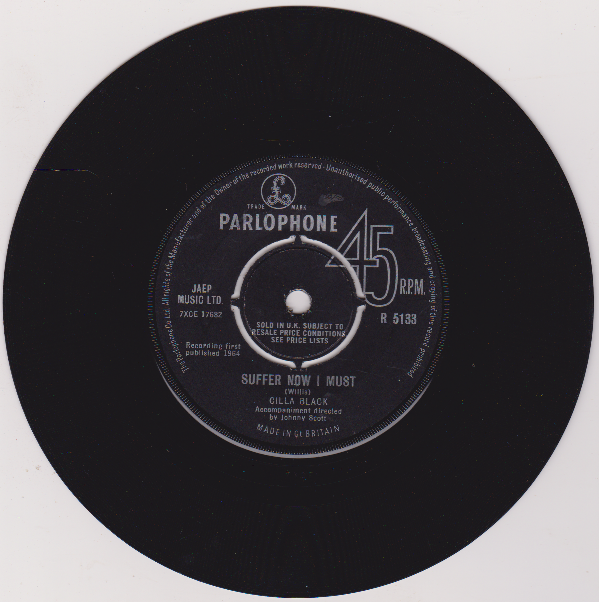 Black vinyl record with Parlophone label on a white background