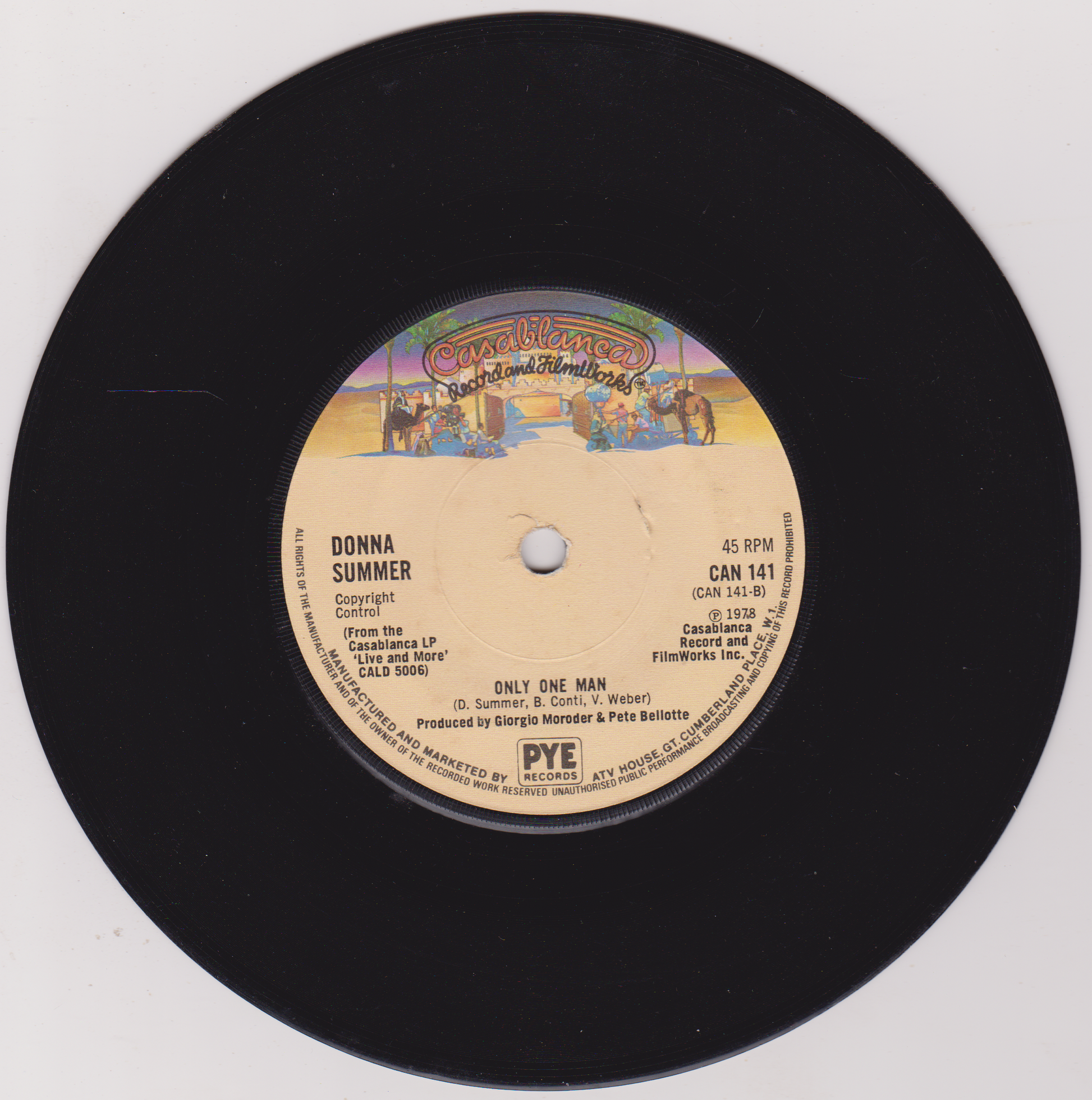Vinyl record with a colorful label featuring text and graphics on a white background