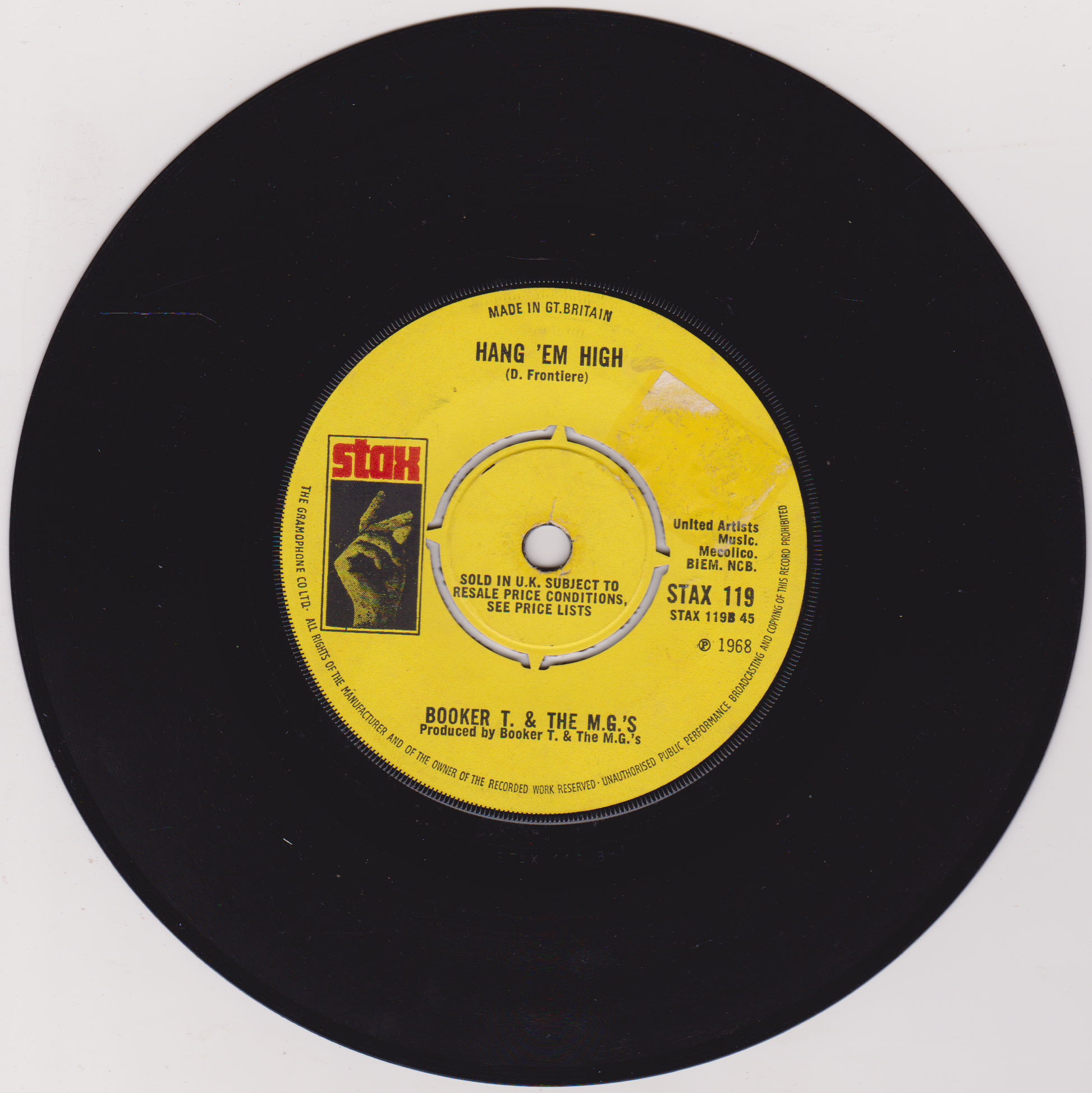 Vinyl record with yellow label featuring Stax Records logo on a white background