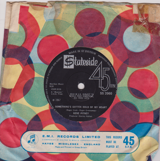 Colorful vinyl record cover with geometric pattern and 'Stateside' label