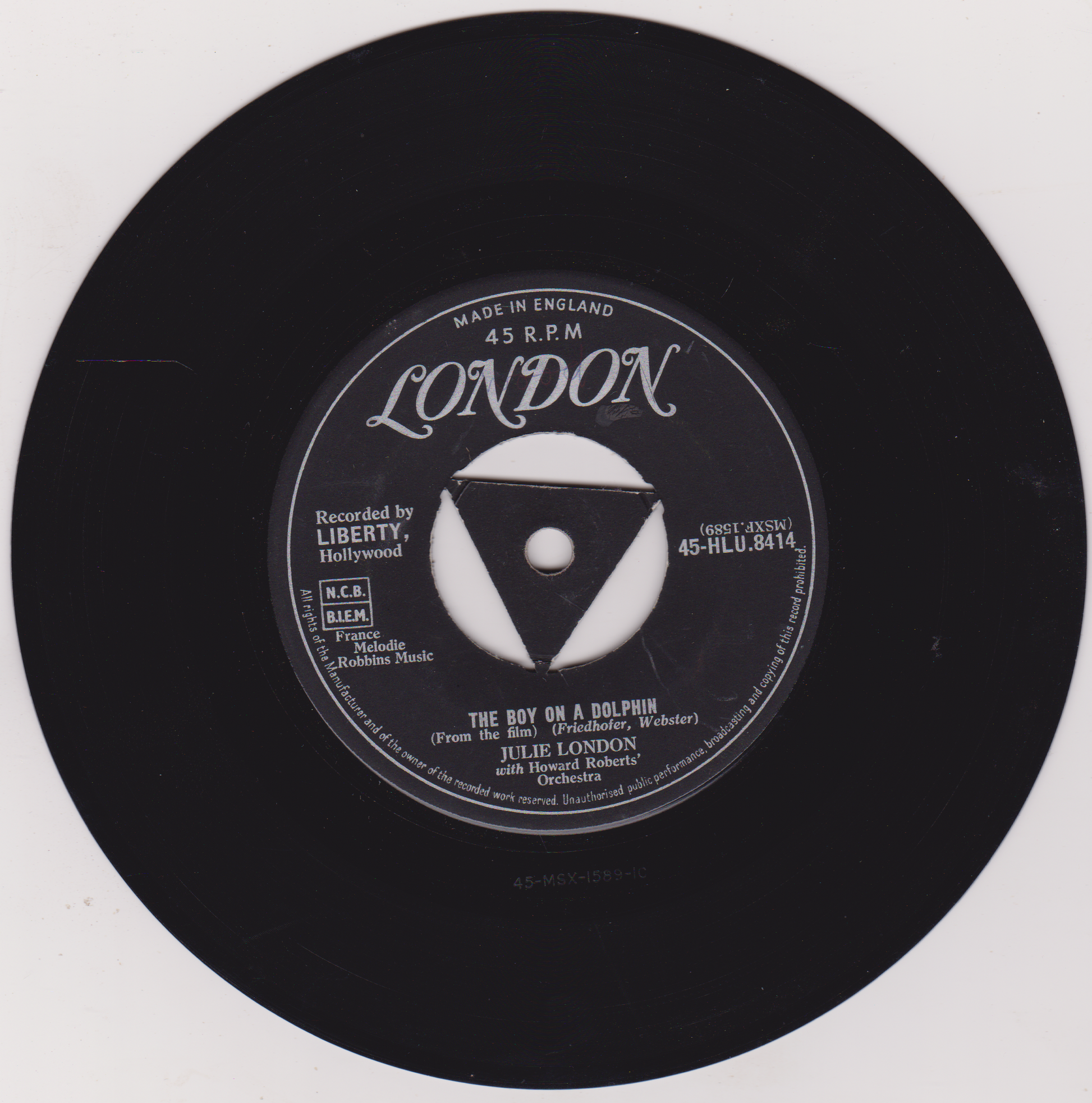 Black vinyl record label with text and a logo on a white background