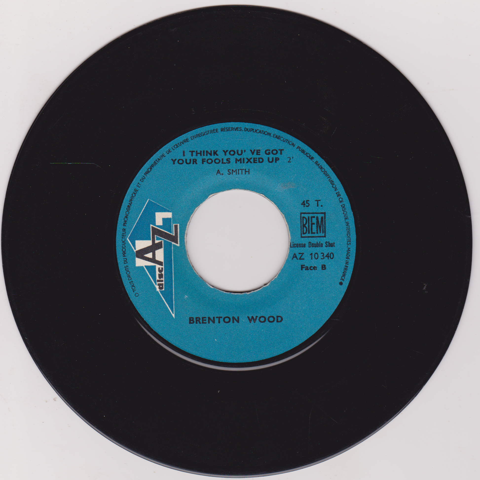 Vinyl record with blue label on a white background