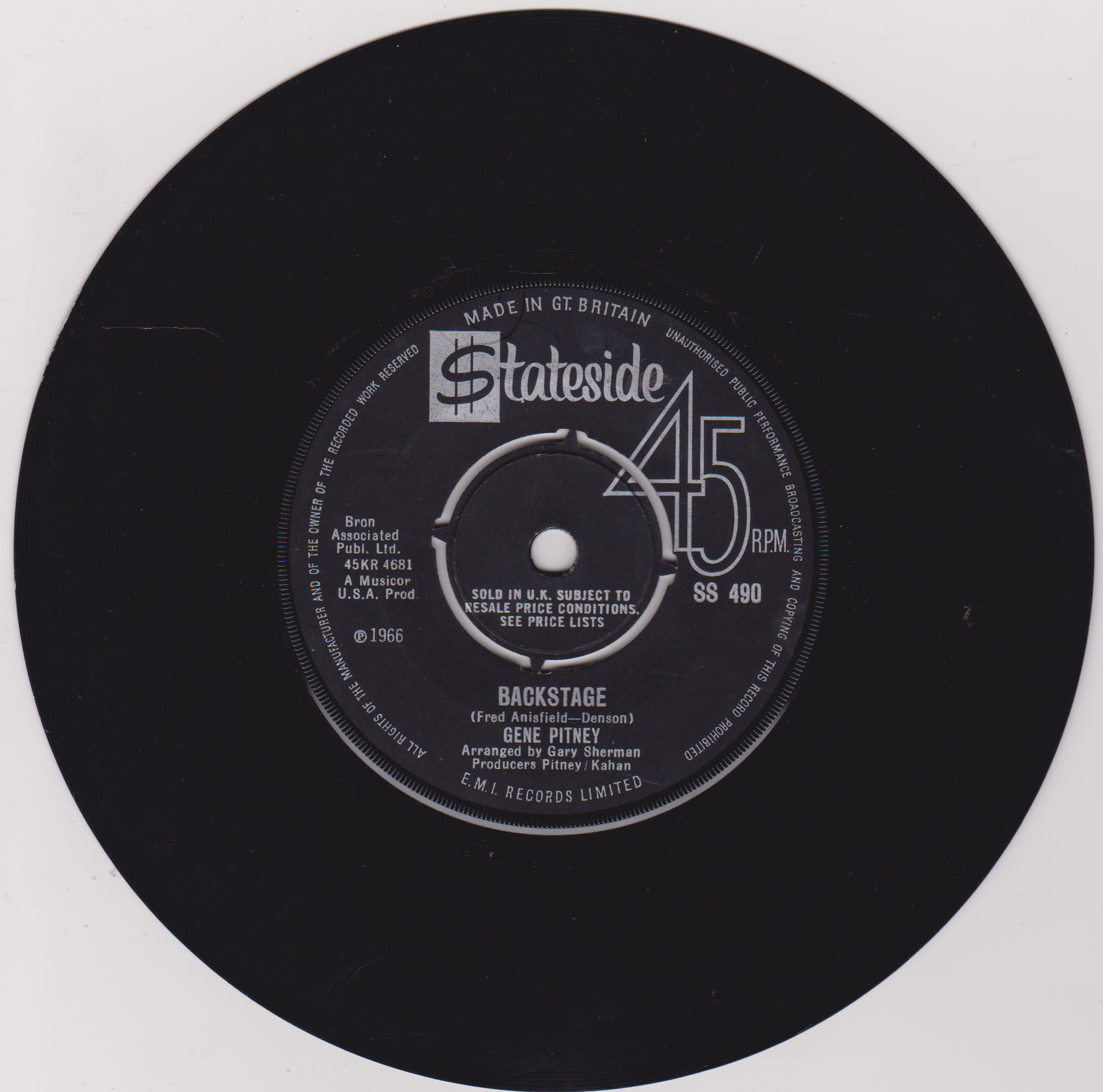 Black vinyl record label with text and branding on a white background