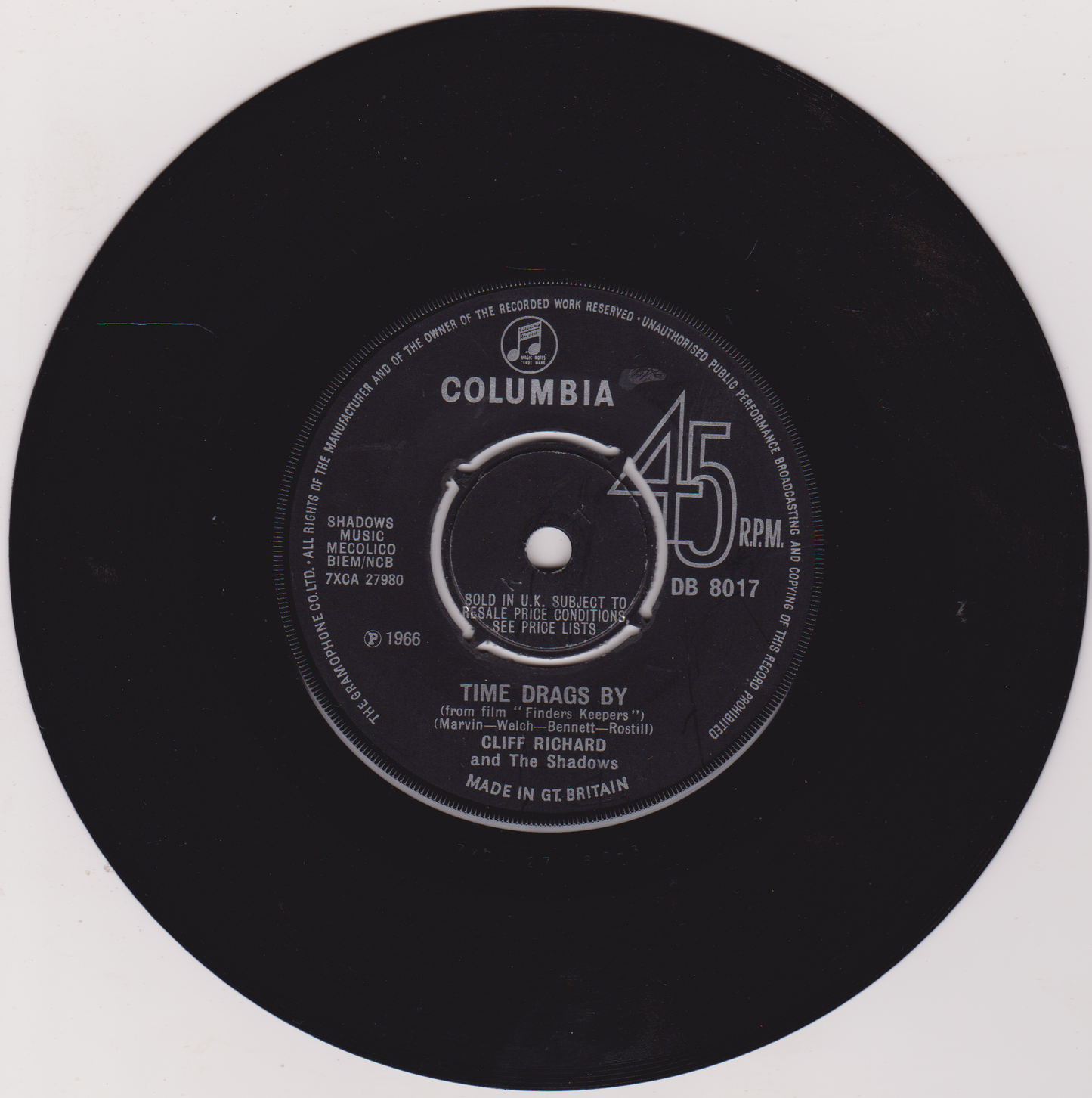 Black vinyl record with Columbia label and song information on a white background