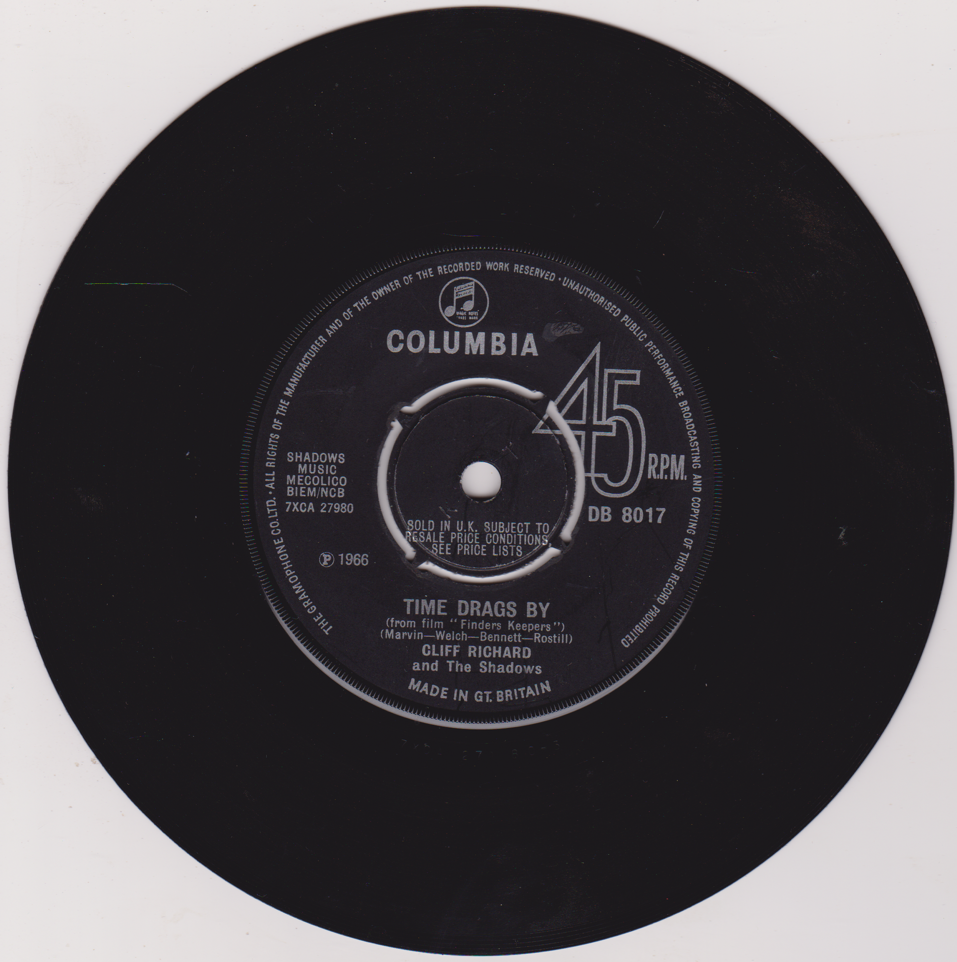 Black vinyl record with Columbia label and song information on a white background