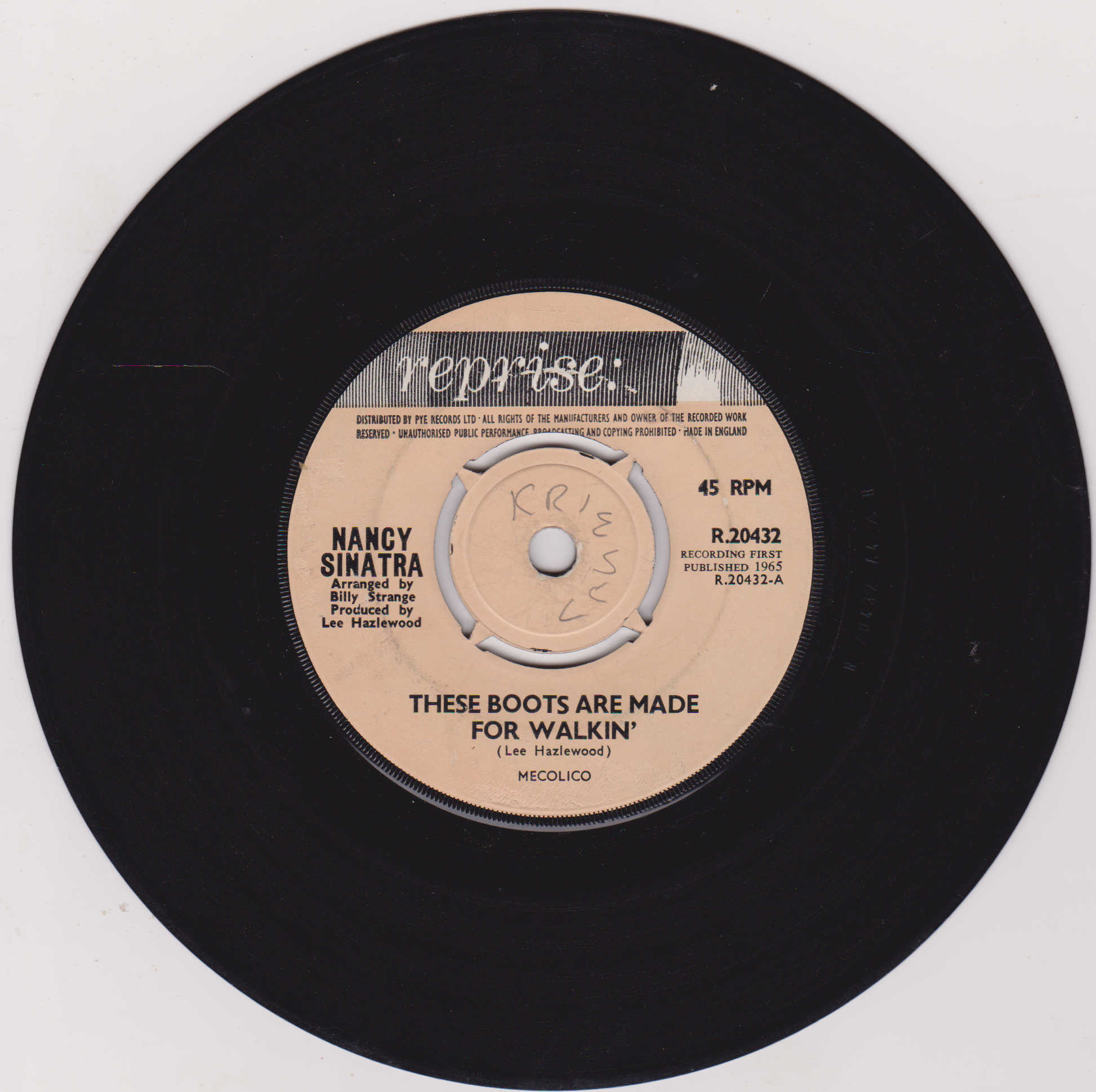 Vinyl record with Nancy Sinatra's 'These Boots Are Made for Walkin'' on a white background