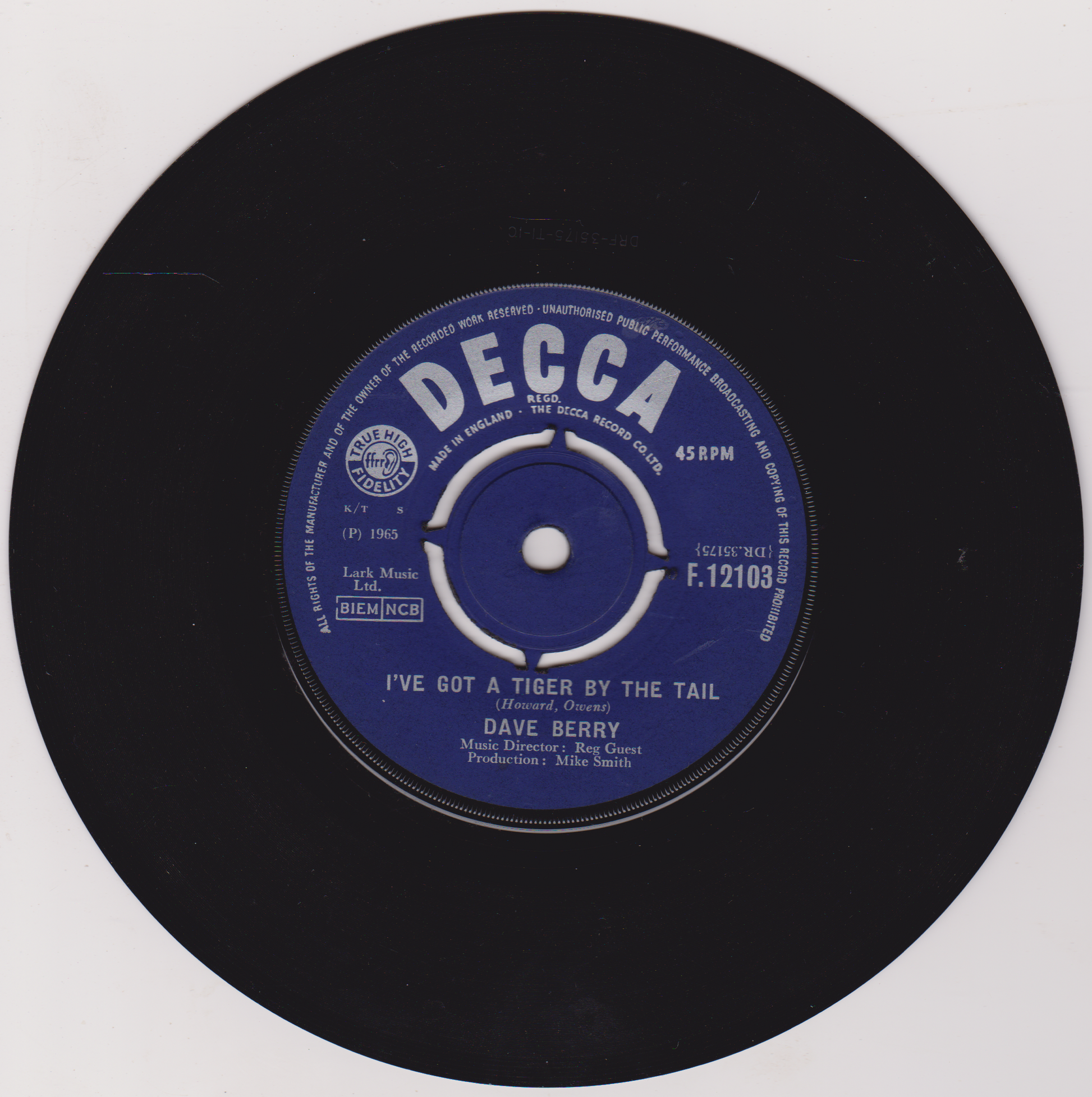 Black vinyl record with a blue Decca label on a white background