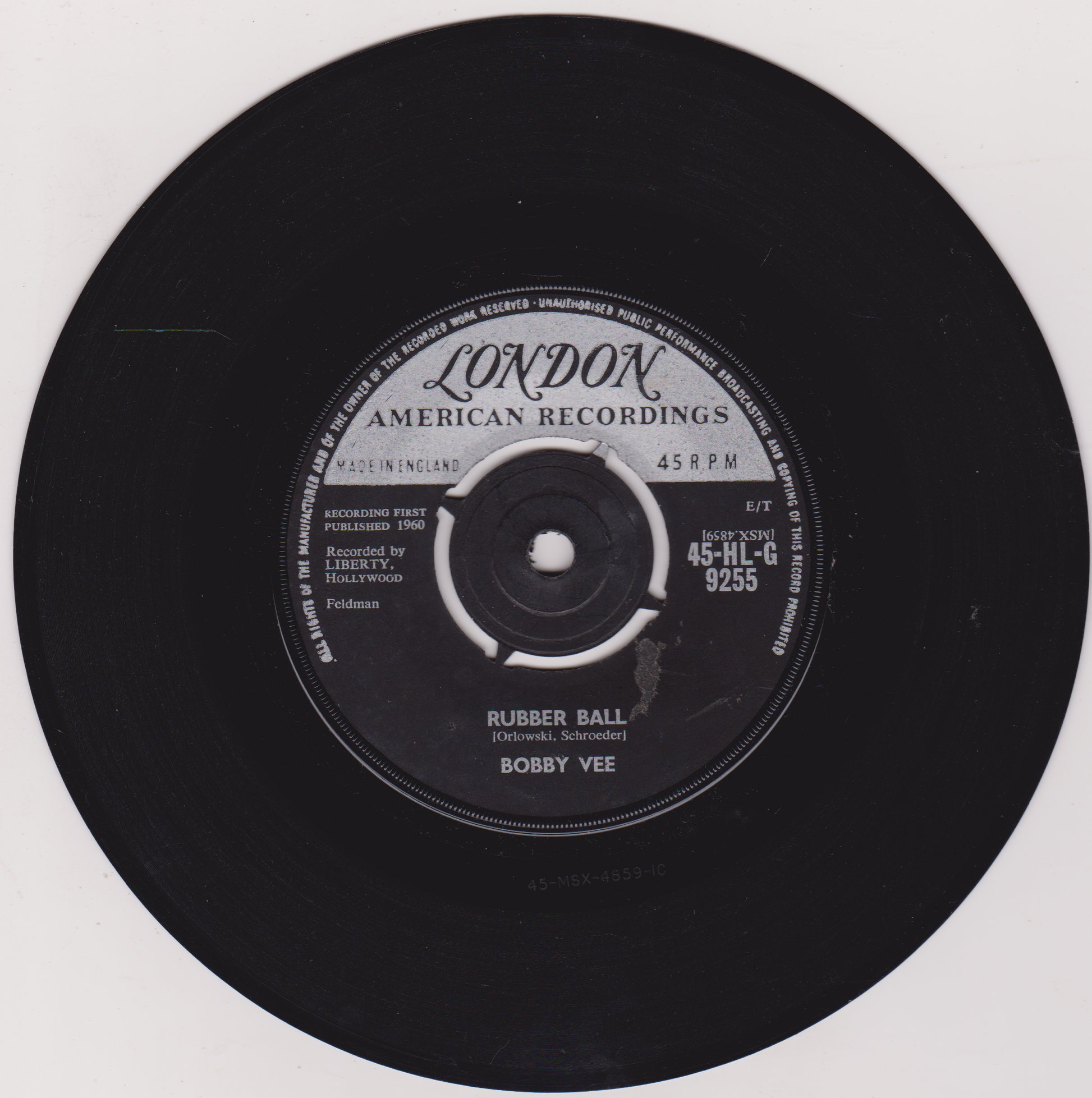 Black vinyl record with 'London American Recordings' label on a white background