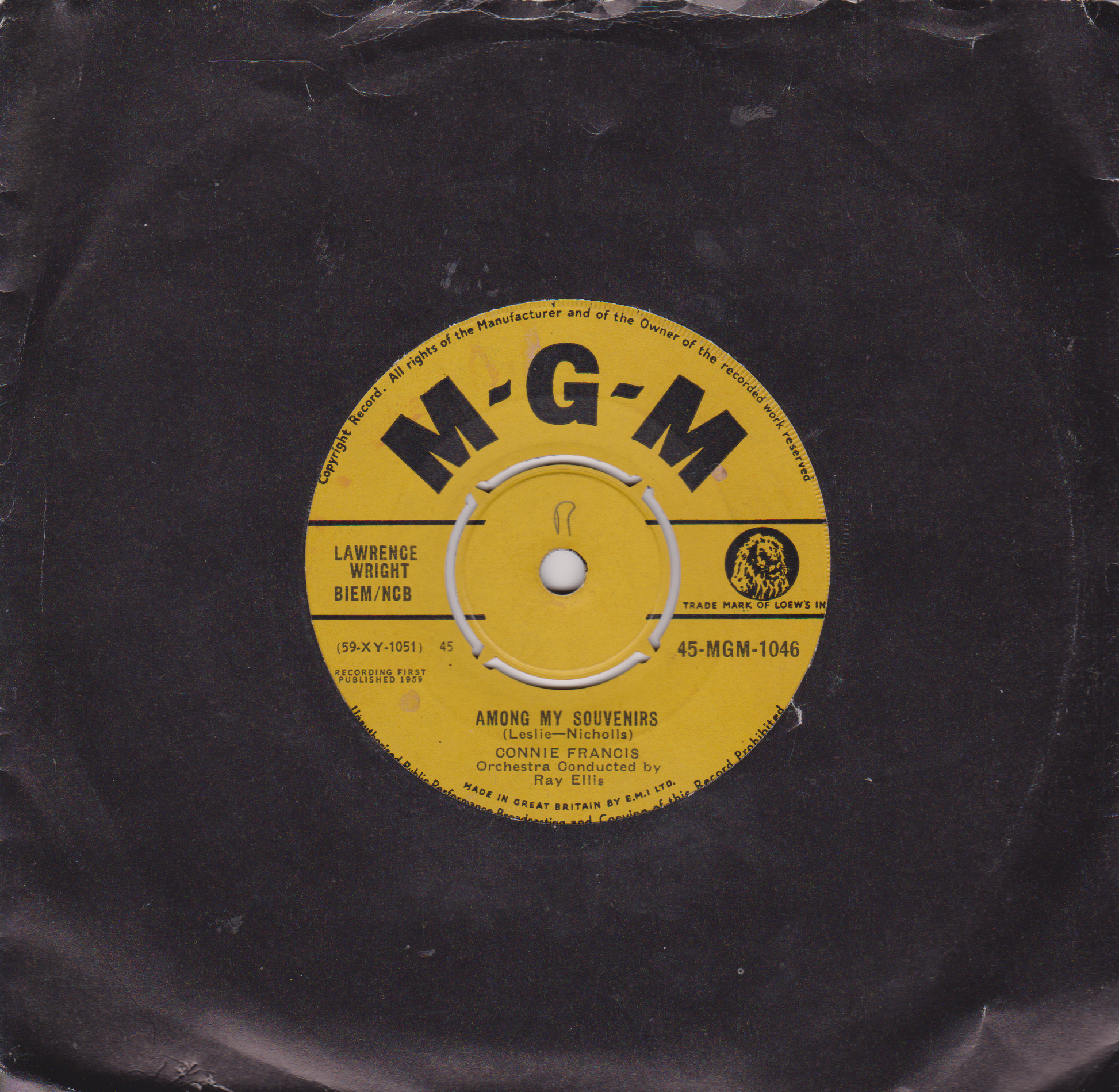 Yellow MGM label on a black vinyl record